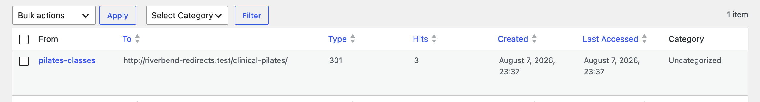 The Rank Math Redirections list showing one redirect with its From and To addresses, a type of 301, and the Hits and Last Accessed columns filled in